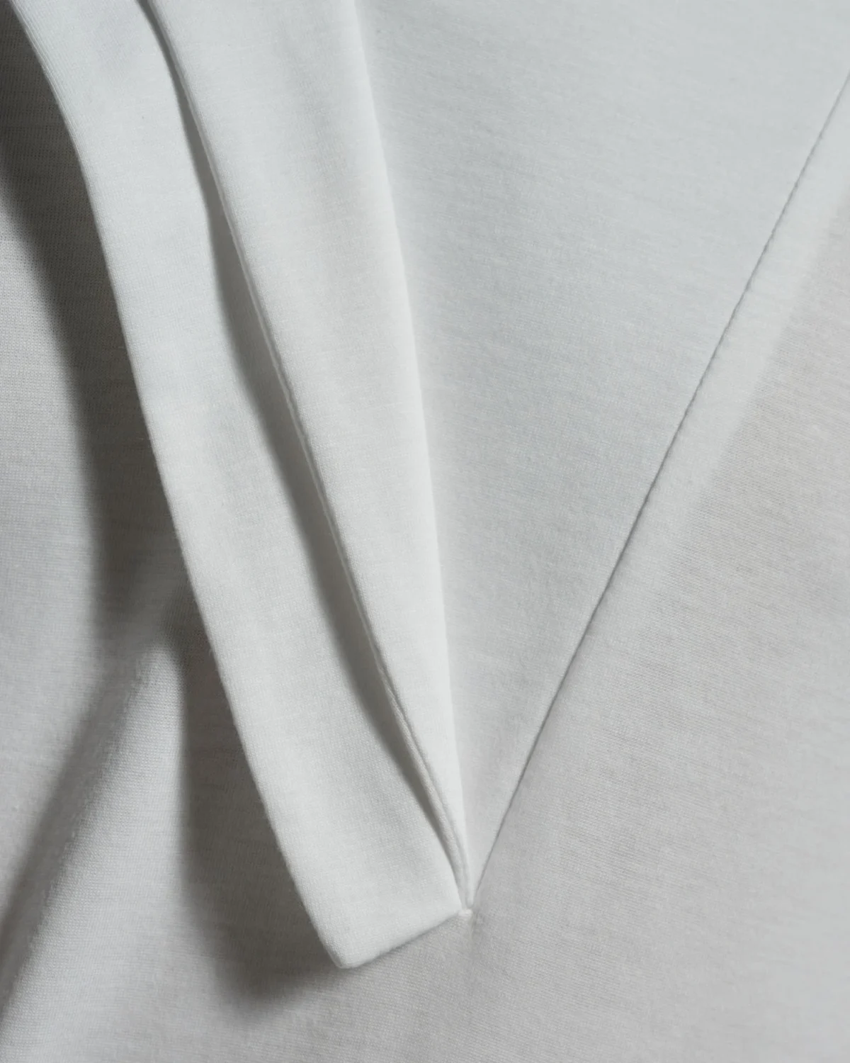 Bib Fronted V-neck with Panelled Shapes