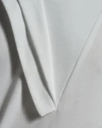 Bib Fronted V-neck with Panelled Shapes