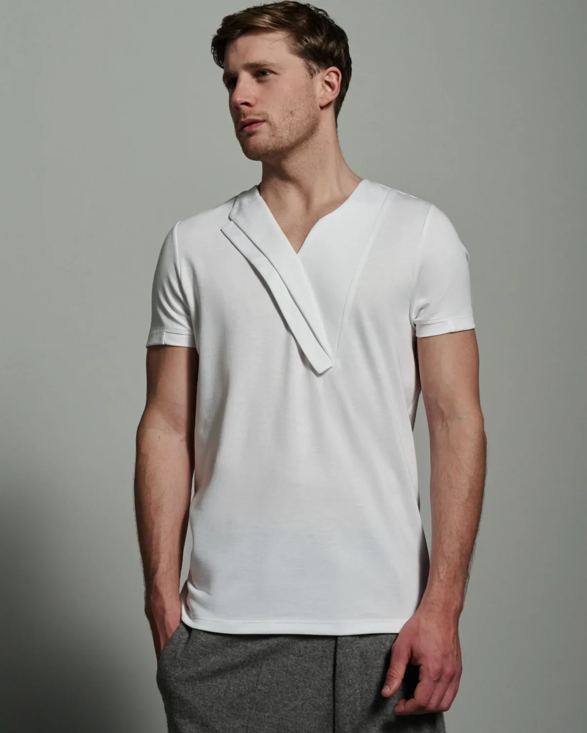 Bib Fronted V-neck with Panelled Shapes