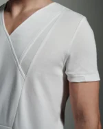 Bib Fronted V-neck with Panelled Shapes