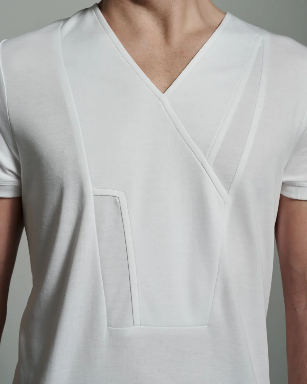 Bib Fronted V-neck with Panelled Shapes