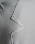 Bib Fronted V-neck with Panelled Shapes