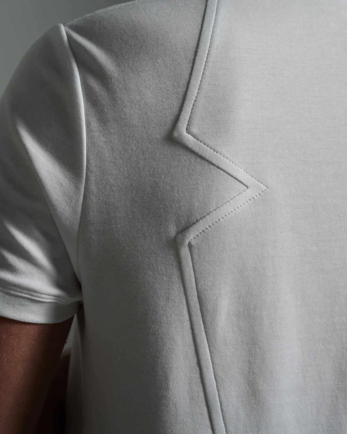 Bib Fronted V-neck with Panelled Shapes