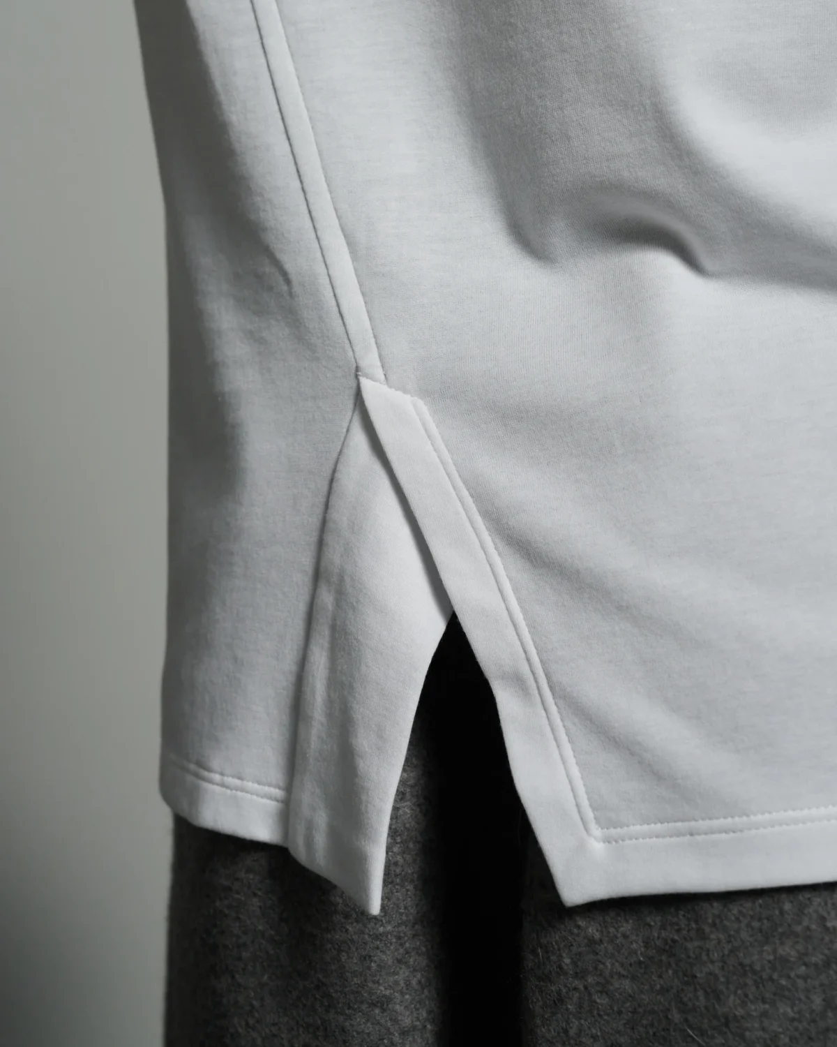 Bib Fronted V-neck with Panelled Shapes
