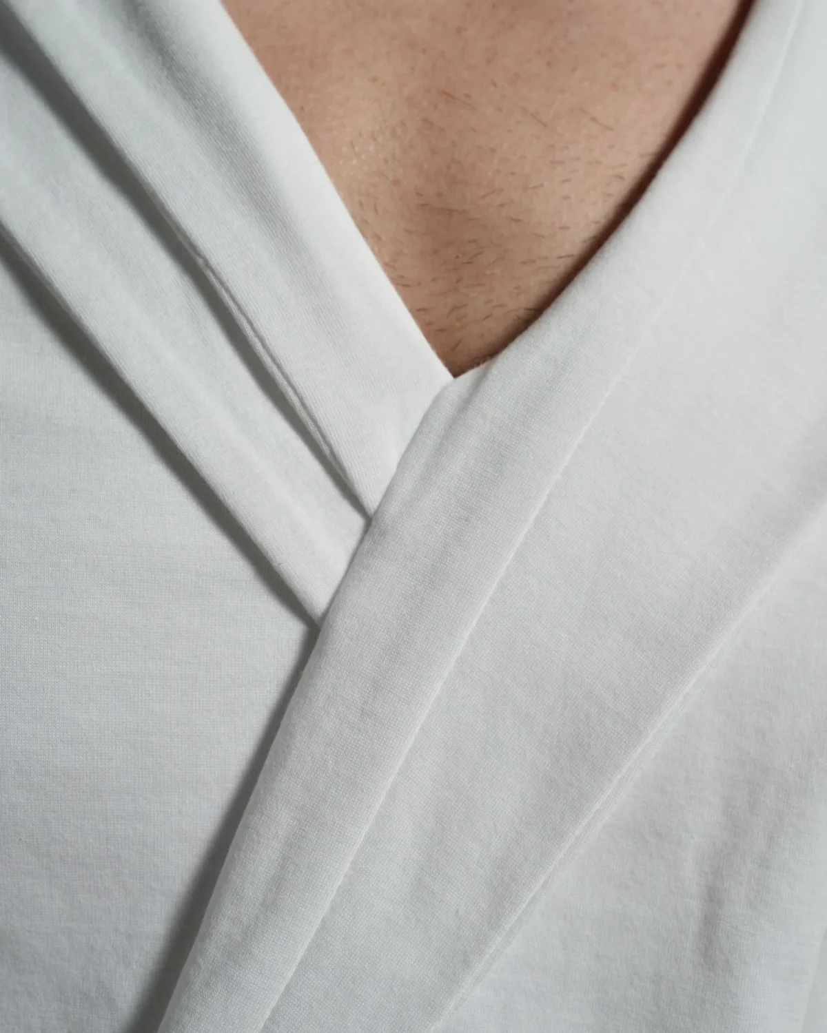 Bib-fronted V-neck with Layered Lapels