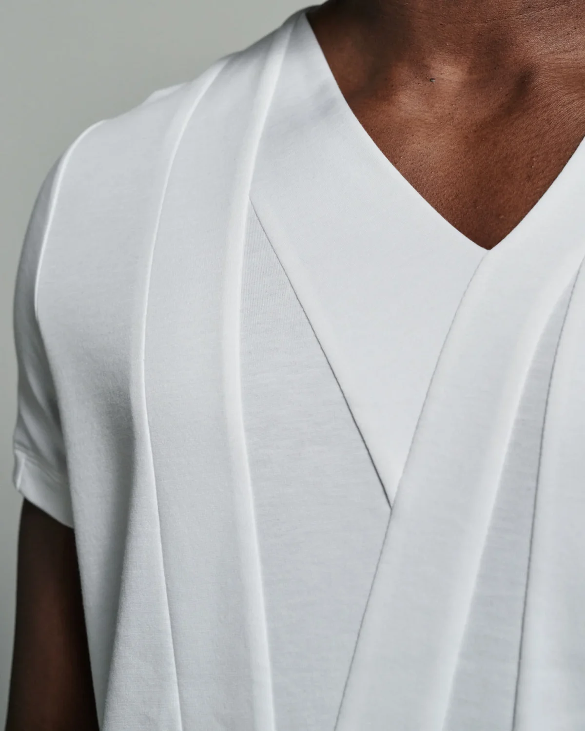 Bib-fronted V-neck with Striped Paneling