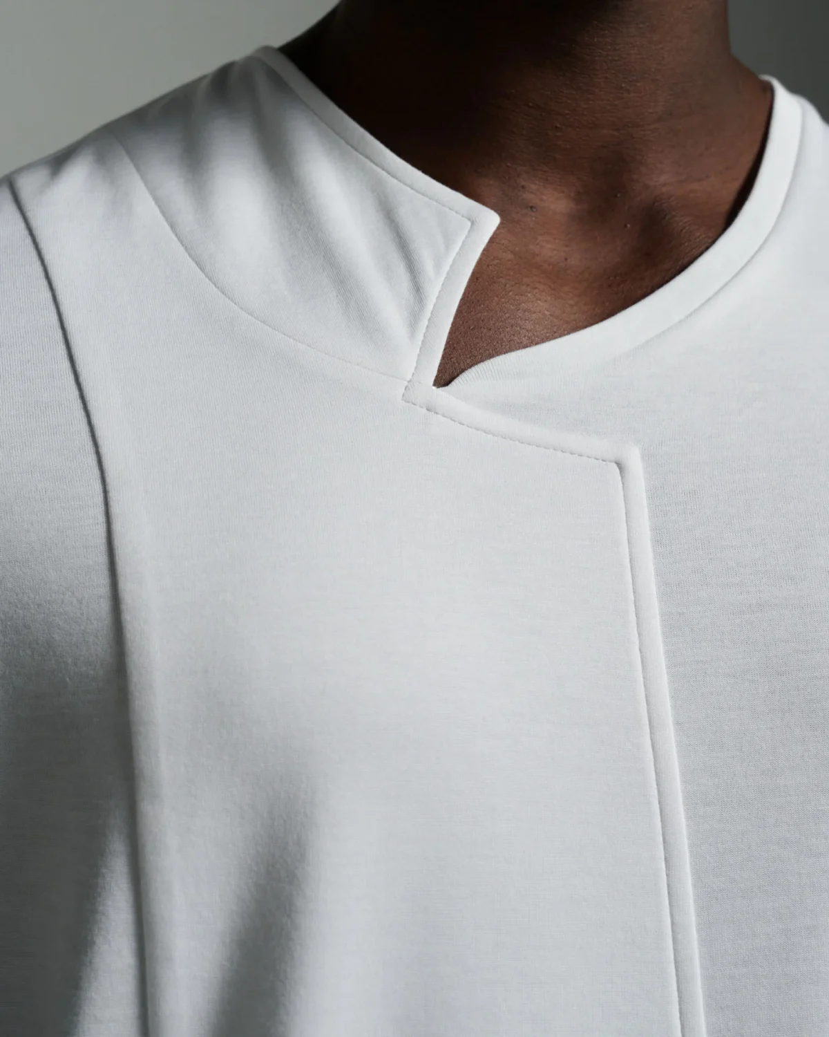 Asymmetric Crew Neck with Notch Lapel & Panel Fronts